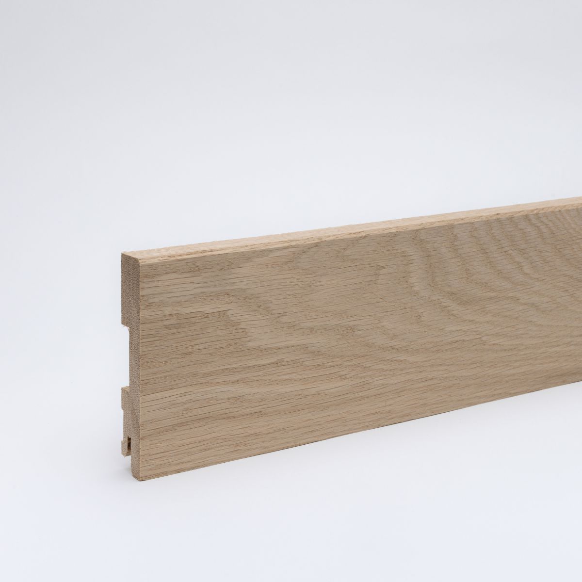 Plinthe en bois massif 100mm biseautée bord d'attaque - Chêne brut