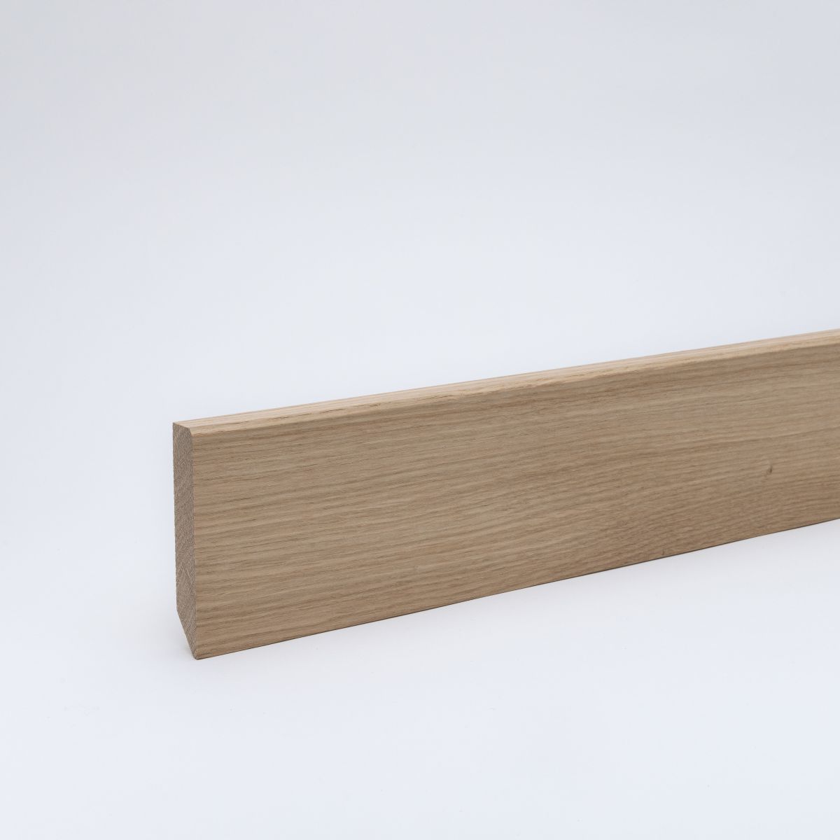 Plinthe en bois massif 80x16mm bord d'attaque chanfreiné - chêne brut